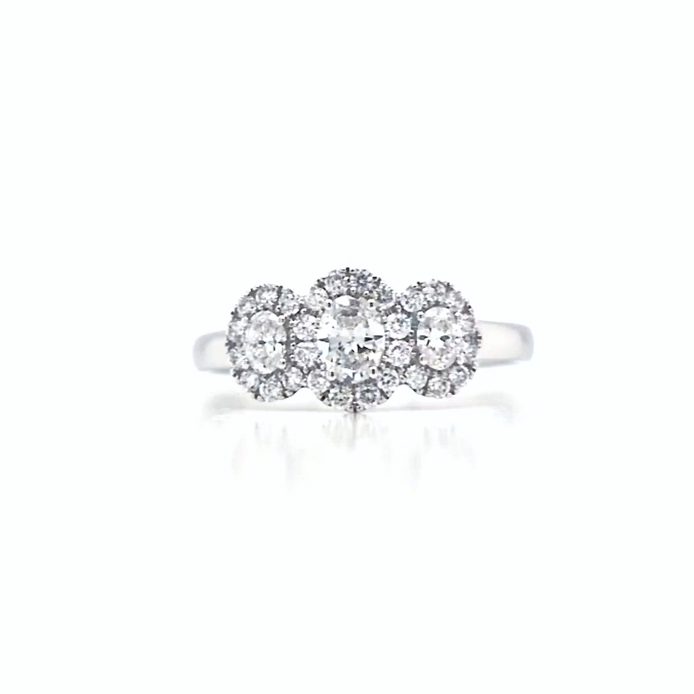 
                
                    Load image into Gallery viewer, 18ct White Gold Oval Three Stone Halo Cluster Ring- 0.63ct
                
            