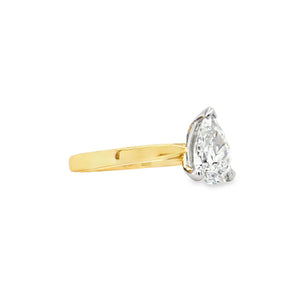 18ct yellow gold and platinum pear-cut diamond solitaire engagement ring, 0.90ct G colour, GIA certified, featuring tapered yellow gold band and platinum claw setting on a white background.