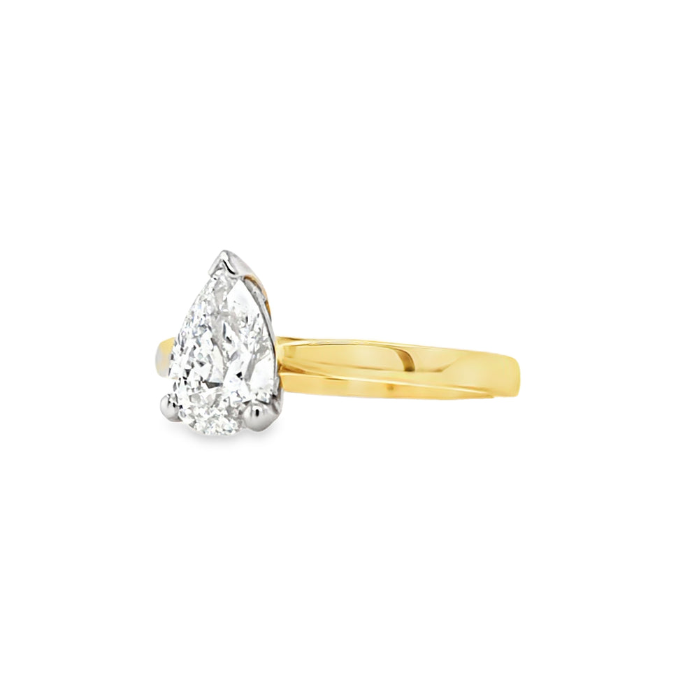 18ct yellow gold and platinum pear-cut diamond solitaire engagement ring, 0.90ct G colour, GIA certified, featuring tapered yellow gold band and platinum claw setting on a white background.