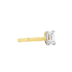18ct yellow gold and platinum emerald-cut diamond solitaire engagement ring, 0.90ct E colour mined diamond, GIA certified, with tapered yellow gold band and platinum claw setting on a white background