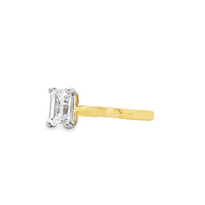 18ct yellow gold and platinum emerald-cut diamond solitaire engagement ring, 0.90ct E colour mined diamond, GIA certified, with tapered yellow gold band and platinum claw setting on a white background