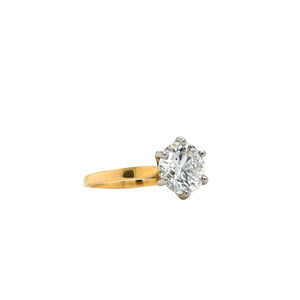 Round lab grown diamond in a six claw platinum setting with a slightly tapered 18ct yellow gold shank
