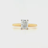 18ct yellow gold and platinum elongated cushion-cut diamond solitaire engagement ring, 1.00ct F colour mined diamond, GIA certified, featuring tapered yellow gold band and platinum claw setting on a white background.