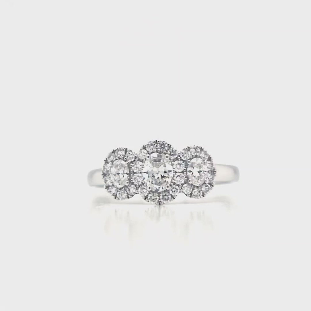 
                
                    Load and play video in Gallery viewer, 18ct White Gold Oval Three Stone Halo Cluster Ring- 0.63ct
                
            