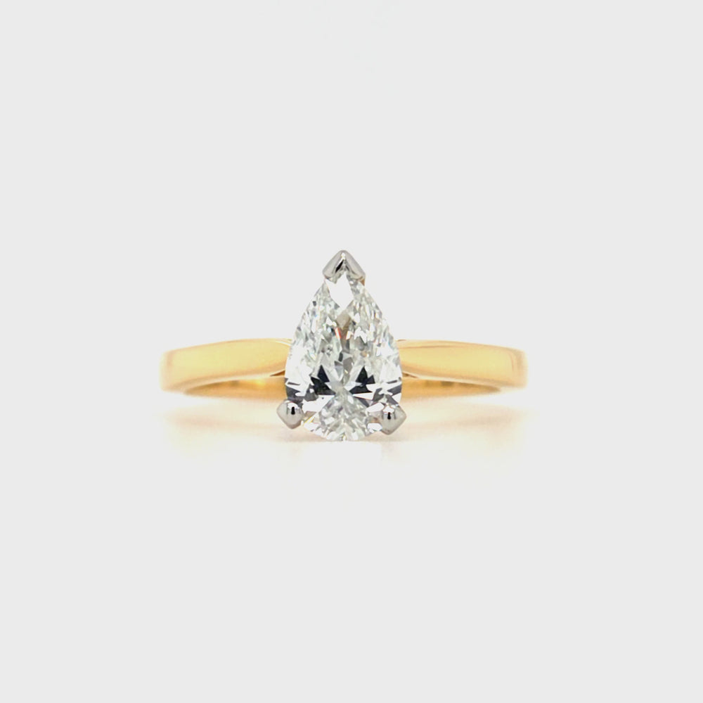 
                
                    Load and play video in Gallery viewer, 18ct yellow gold and platinum pear-cut diamond solitaire engagement ring, 0.90ct G colour, GIA certified, featuring tapered yellow gold band and platinum claw setting on a white background.
                
            