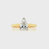 18ct yellow gold and platinum pear-cut diamond solitaire engagement ring, 0.90ct G colour, GIA certified, featuring tapered yellow gold band and platinum claw setting on a white background.