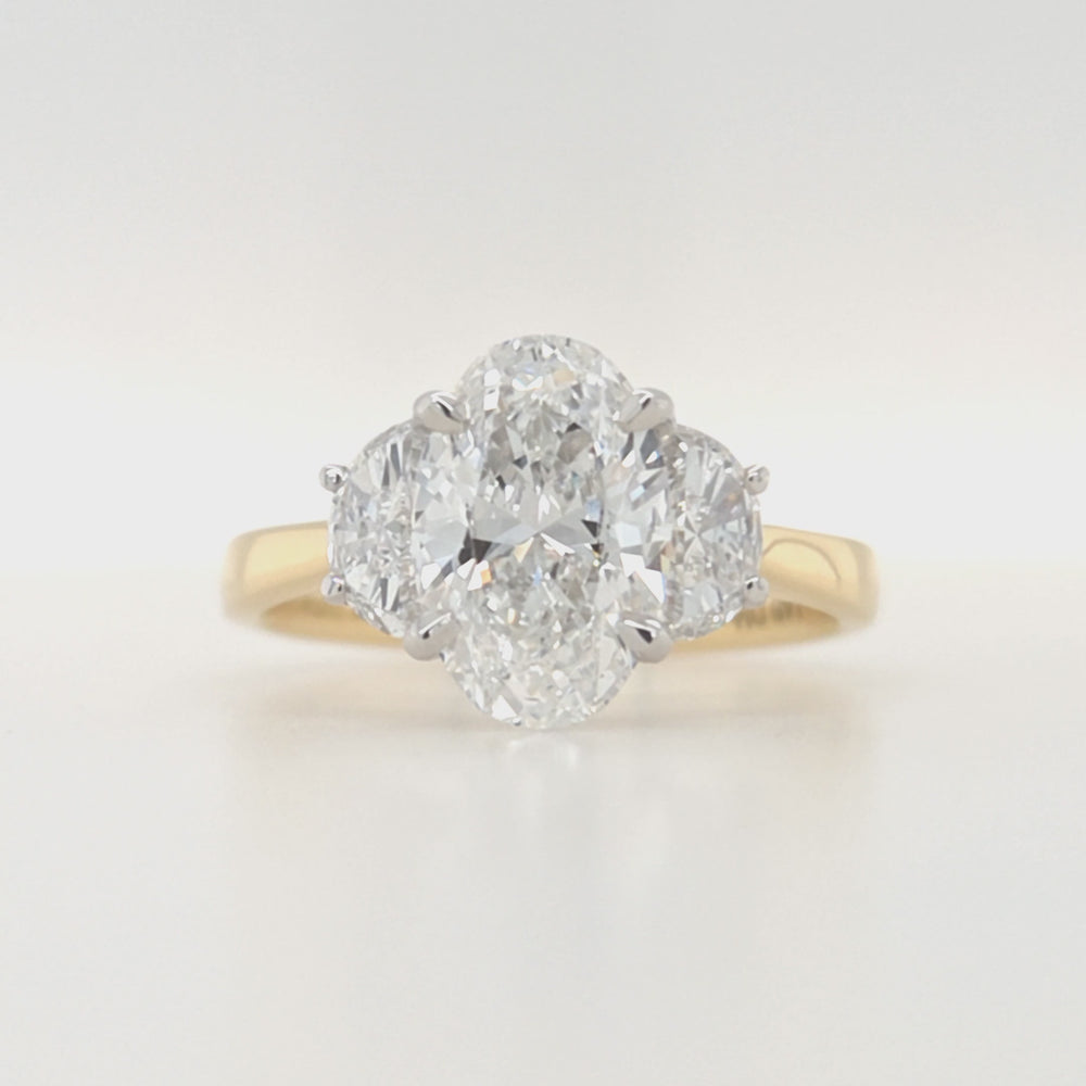 
                
                    Load and play video in Gallery viewer, 18ct Gold Oval &amp;amp; Half-moon Cut Three Stone Lab Grown Diamond Engagement Ring- 2.62ct
                
            