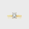 18ct yellow gold and platinum emerald-cut diamond solitaire engagement ring, 0.90ct E colour mined diamond, GIA certified, with tapered yellow gold band and platinum claw setting on a white background