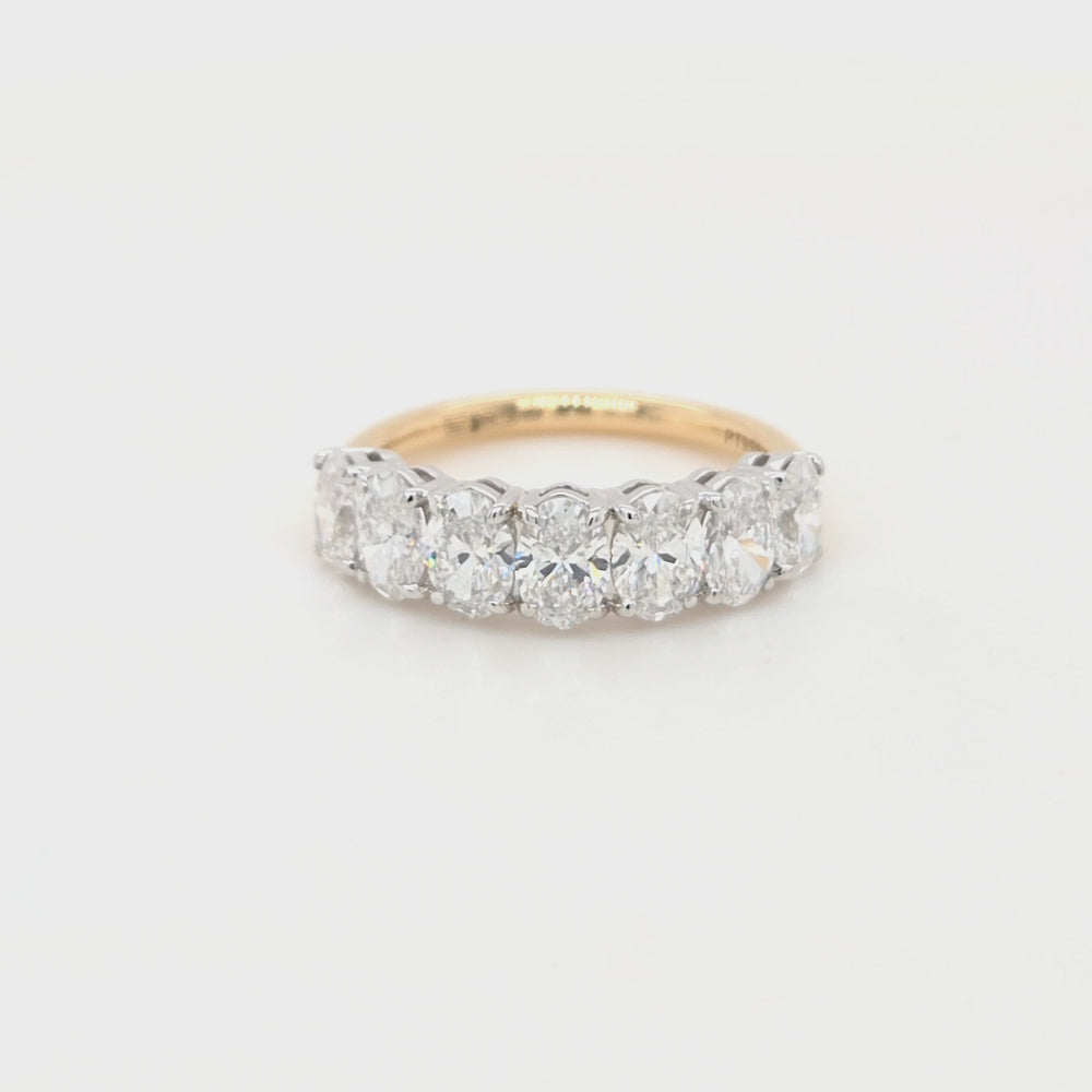 
                
                    Load and play video in Gallery viewer, seven oval-cut lab grown diamonds each in a four claw platinum setting with a yellow gold shank
                
            