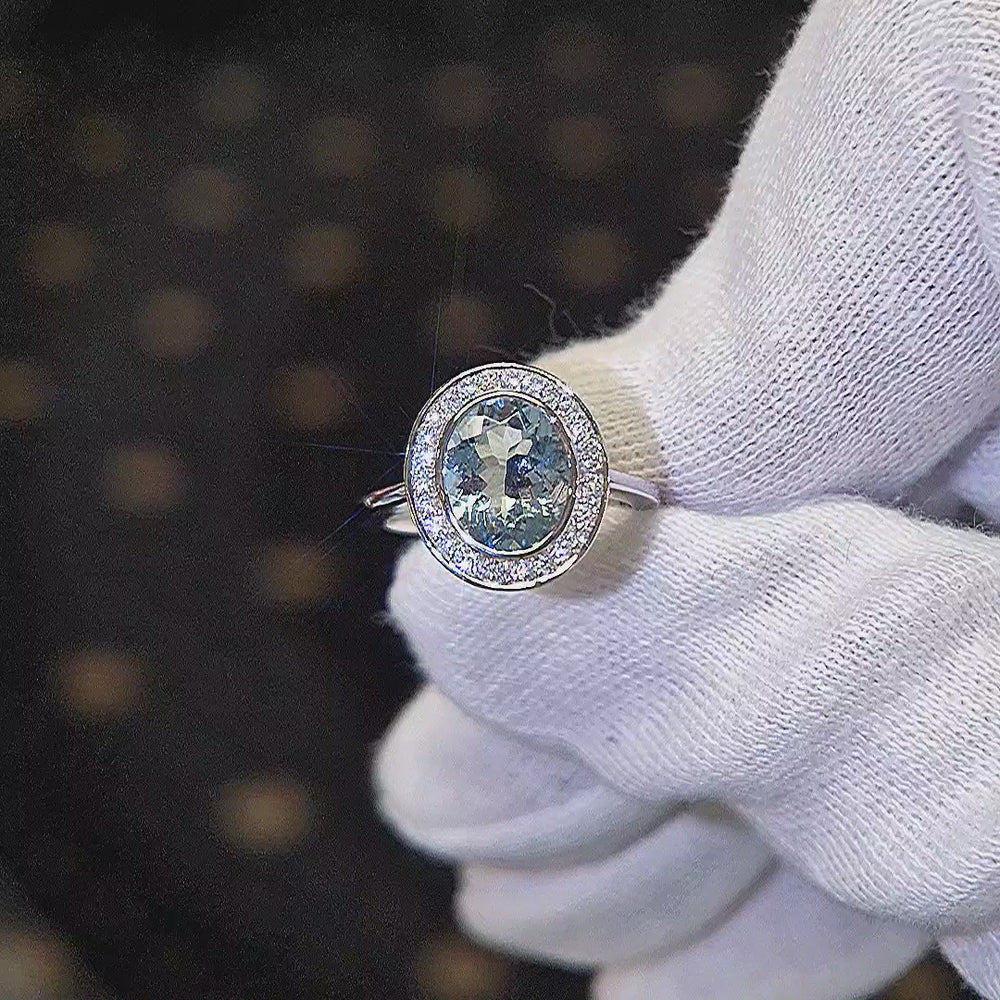 
                
                    Load and play video in Gallery viewer, 18ct White Gold Aquamarine &amp;amp; Diamond Oval Cluster Ring
                
            