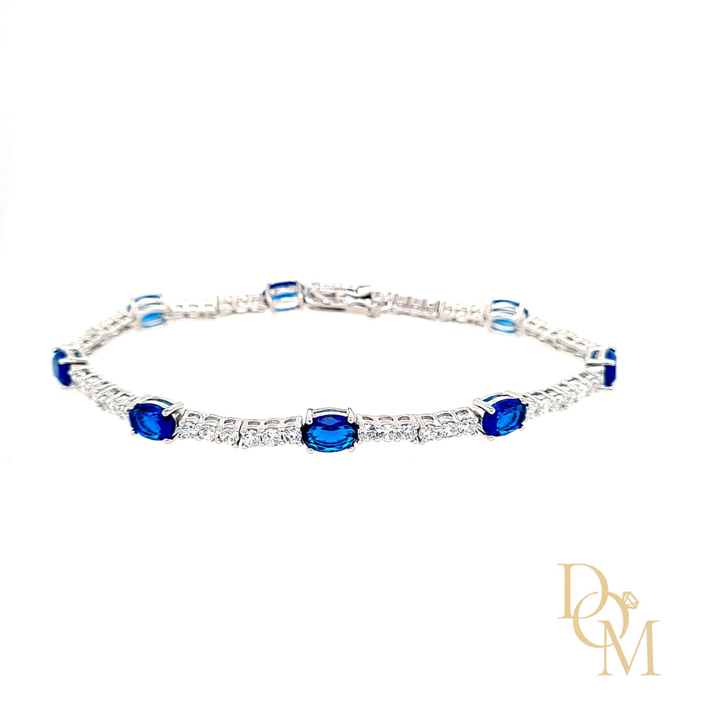 
                
                    Load image into Gallery viewer, Sterling Silver Tennis Bracelet Set With Oval Sapphire CZs
                
            
