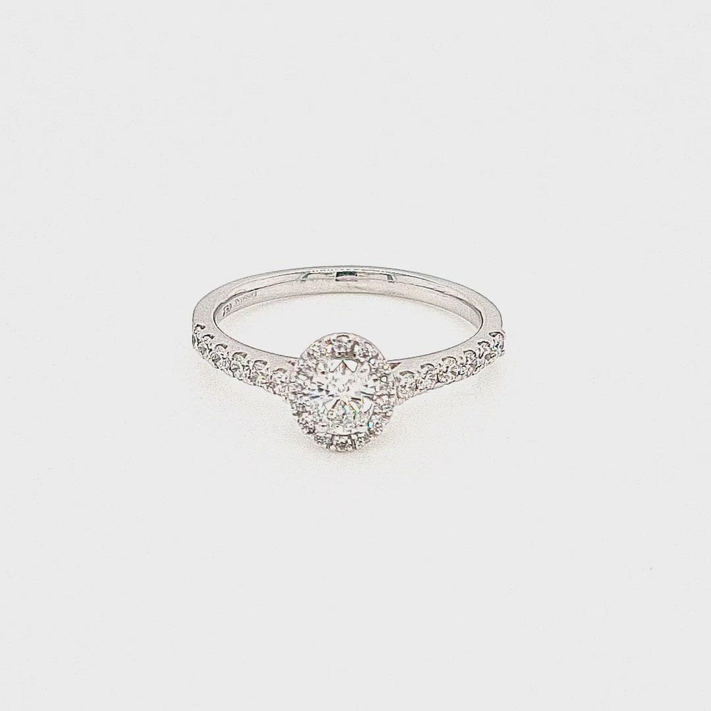 
                
                    Load and play video in Gallery viewer, 18ct White Gold Oval Halo Diamond Engagement Ring
                
            