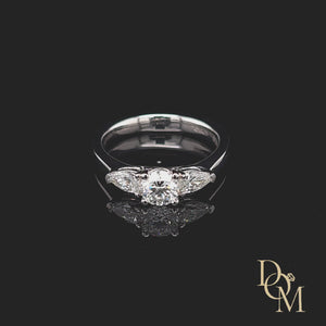 
                
                    Load and play video in Gallery viewer, Platinum 3 stone engagement ring. Round centre in a four claw setting with a pear cut diamond on either side
                
            