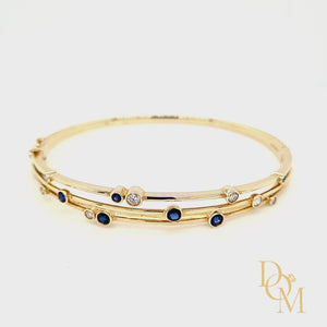 
                
                    Load and play video in Gallery viewer, 9ct Yellow Gold Sapphire &amp;amp; Diamond Bangle
                
            